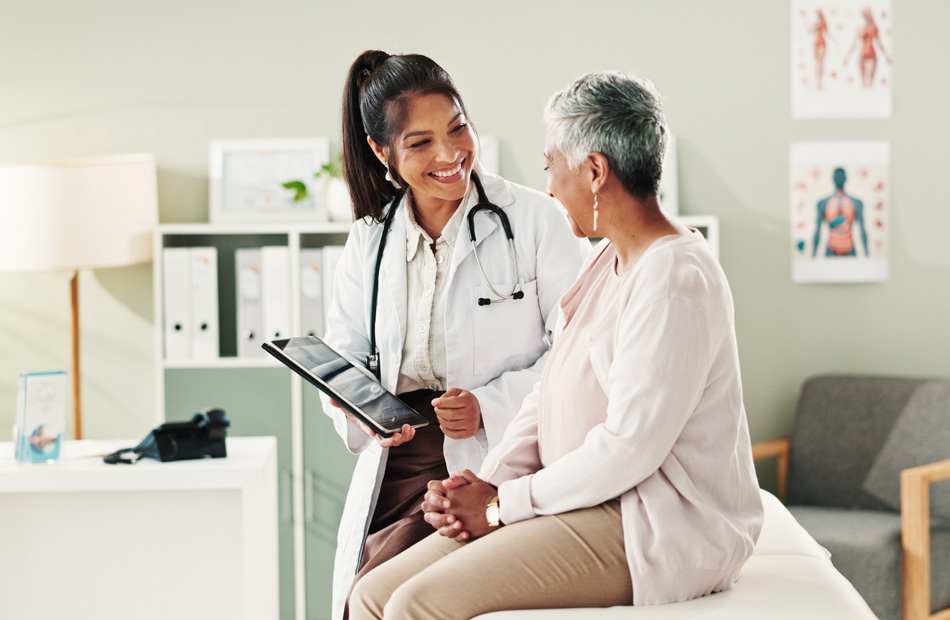 Doctor reviewing information with patient in clinic